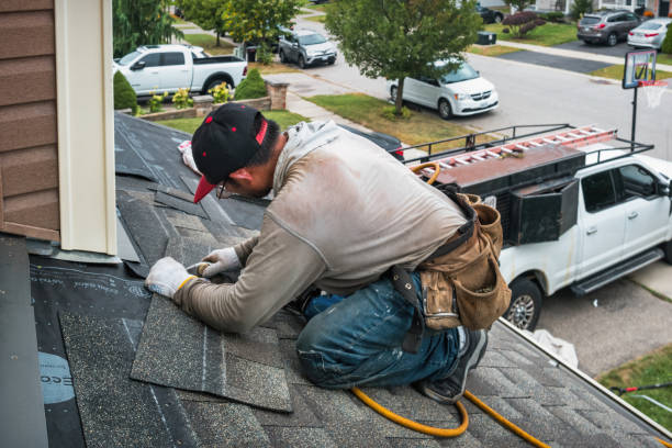 Professional Roof Replacement technician working in Sheakleyville, PA